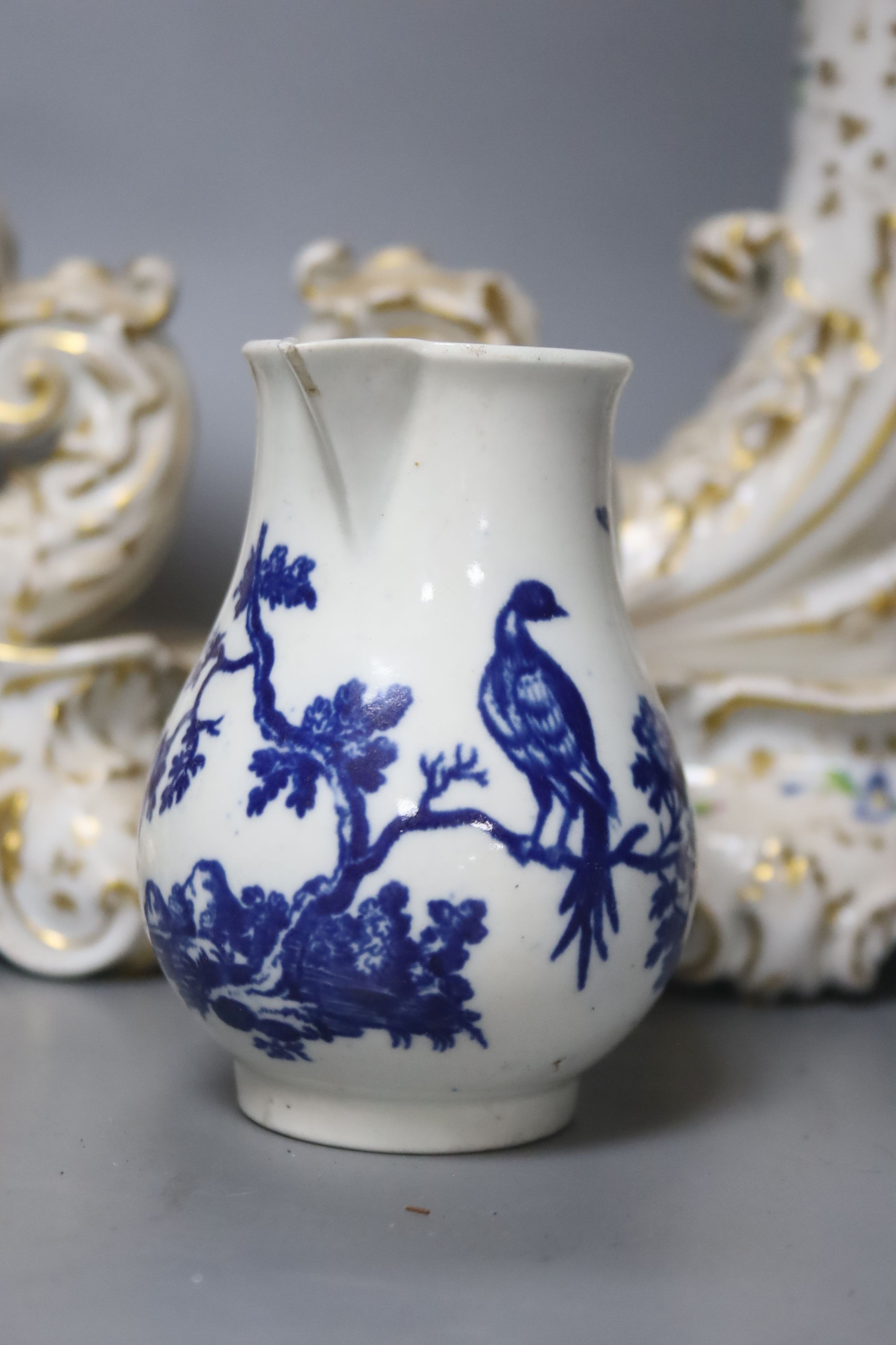 A pair of mid 19th century Jacob Petit cornucopia vases and a Worcester blue and white jug, tallest 20cm